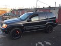 2001 Jeep Grand Cherokee II (WJ), чёрный - вид 1