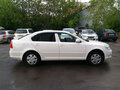 2013 Skoda Octavia II (A5) Рестайлинг, белый - вид 3