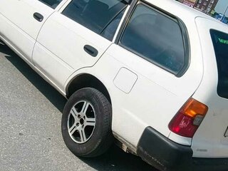 1999 Toyota Corolla VII (E100), белый, 325000 рублей, вид 3