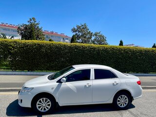 2010 Toyota Corolla X (E140, E150), белый, 1055000 рублей, вид 4