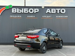 2012 Kia Rio 4-speed III, чёрный, 925000 рублей, вид 2