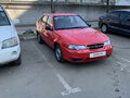 2011 Daewoo Nexia I Рестайлинг, красный - вид 4