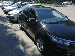 2014 Toyota Corolla XI (E160, E170, E180), чёрный, 1700000 рублей, вид 2