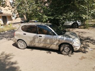 1998 Daihatsu Storia I (M100), серый, 235000 рублей, вид 2