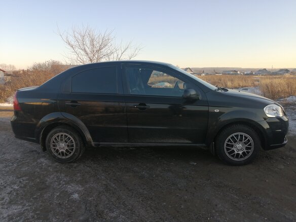 2011 Chevrolet Aveo I Рестайлинг, чёрный - вид 2