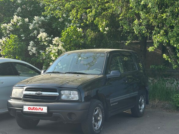 1999 Chevrolet Tracker II, чёрный - вид 2