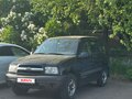 1999 Chevrolet Tracker II, чёрный - вид 2