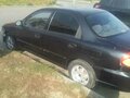 2007 Kia Spectra I Рестайлинг 2, чёрный - вид 4