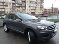 2011 Volkswagen Touareg II, серый - вид 4