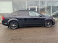 2009 Ford Focus II Рестайлинг, чёрный - вид 2