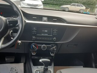 2022 Kia Rio IV Рестайлинг, коричневый, 1800000 рублей, вид 5