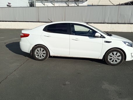 2012 Kia Rio 5-speed III, белый, 880000 рублей, вид 5