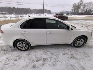 2013 Mitsubishi Lancer X Рестайлинг, белый, 730000 рублей, вид 2