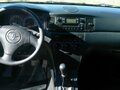 2002 Toyota Corolla IX (E120, E130), синий - вид 8