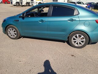 2012 Kia Rio 5-speed III, зелёный, 950000 рублей, вид 4