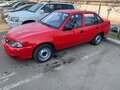 2011 Daewoo Nexia I Рестайлинг, красный - вид 6