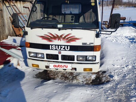 1990 Isuzu Elf (N-series), белый, 1100000 рублей, вид 4