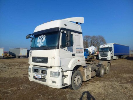 2021 КамАЗ 65209, белый, 2356250 рублей, вид 1