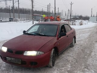 1997 Mitsubishi Carisma I, пурпурный, 180000 рублей, вид 1