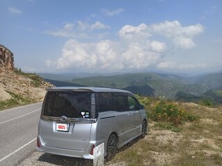 2014 Toyota Voxy III (R80), серебристый, 2096000 рублей, вид 4