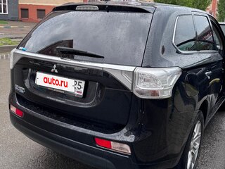 2014 Mitsubishi Outlander PHEV III Рестайлинг, чёрный, 1850000 рублей, вид 3