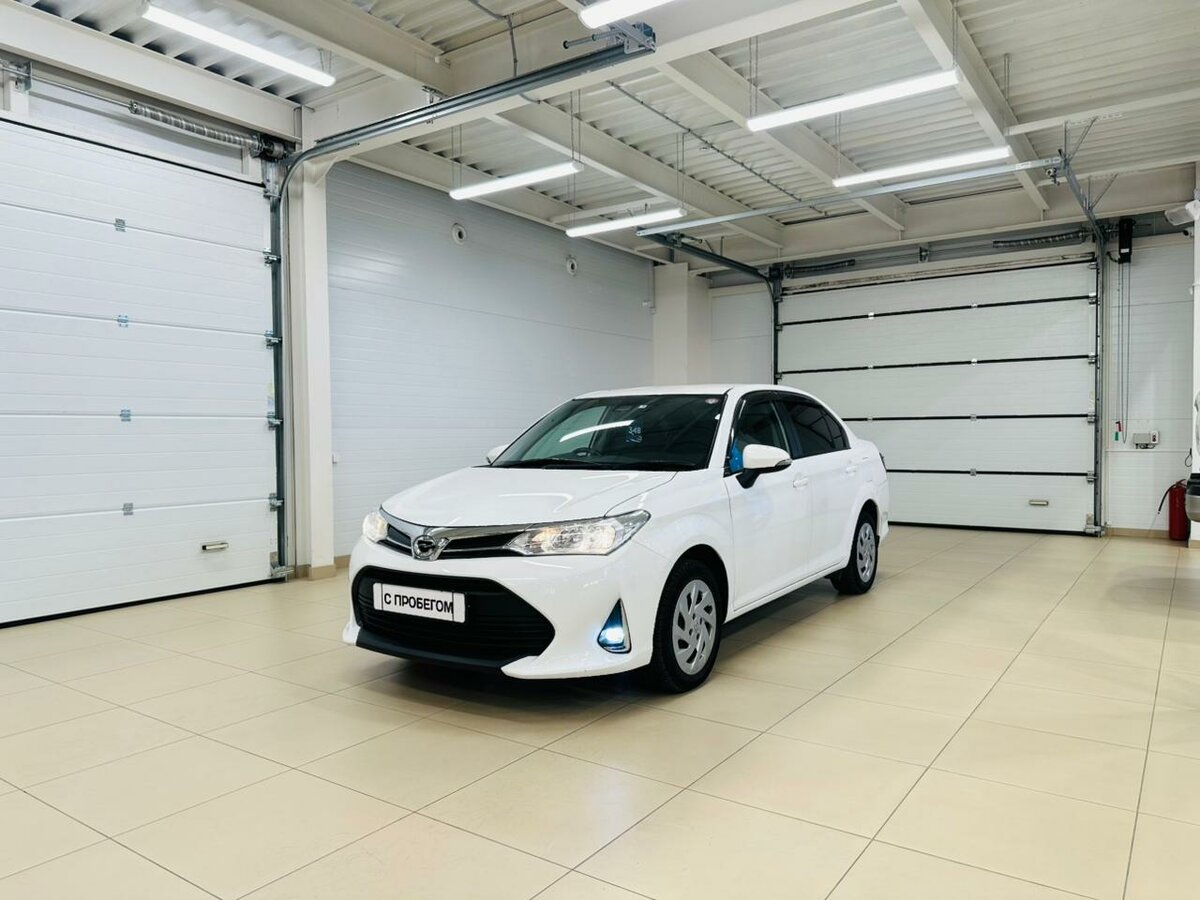 Открыть фотографии: Toyota Corolla XI (E160, E170) Рестайлинг 2