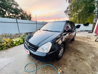 2009 Kia Carnival II, чёрный, 820000 рублей, вид 1