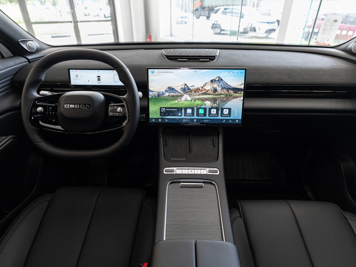 Открыть фотографии: Omoda C7
