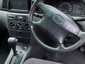 2004 Toyota Corolla IX (E120, E130) Рестайлинг, серый, 420000 рублей - вид 9