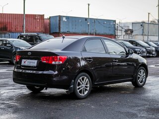 2011 Kia Cerato 6-speed II, красный, 525000 рублей, вид 2