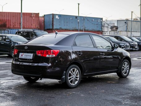 2011 Kia Cerato 6-speed II, красный, 525000 рублей, вид 2