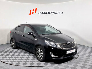 2011 Kia Rio 5-speed III, чёрный, 601000 рублей, вид 3