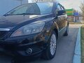 2011 Ford Focus II Рестайлинг, чёрный, 540000 рублей - вид 2