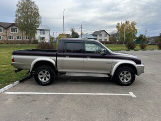 2005 Mitsubishi L200 III, фиолетовый, 820000 рублей, вид 4