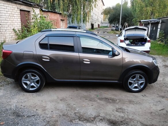 2021 Renault Logan Stepway II Рестайлинг, коричневый, 1149000 рублей - вид 1
