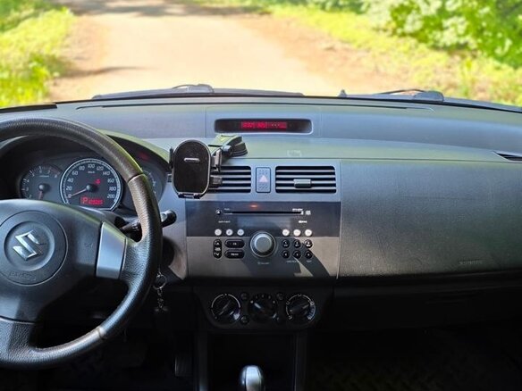2010 Suzuki Swift III, оранжевый, 720000 рублей - вид 11