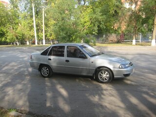 2011 Daewoo Nexia I Рестайлинг, серебристый, 210000 рублей, вид 2