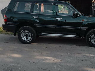 2005 Toyota Land Cruiser 105 100 Series Рестайлинг 1, зелёный, 7500000 рублей, вид 5