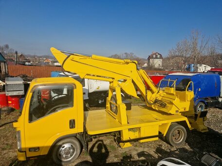 2010 Isuzu Колесные экскаваторы, жёлтый, 4600000 рублей, вид 4