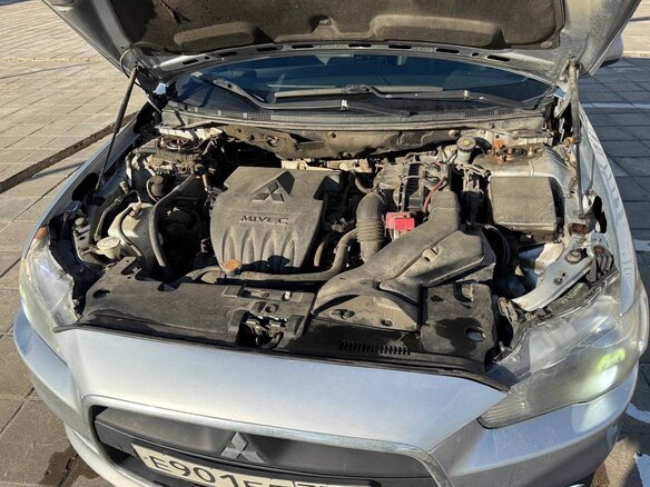 2011 Mitsubishi Lancer X Рестайлинг, серебристый, 660000 рублей - вид 13