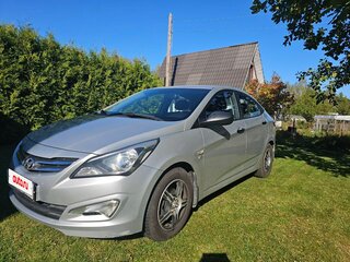 2015 Hyundai Solaris I Рестайлинг, серебристый, 1120000 рублей, вид 2