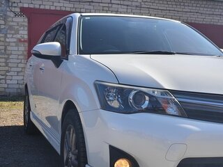 2014 Toyota Corolla Fielder XI (E160, E170, E180), белый, 1370000 рублей, вид 3