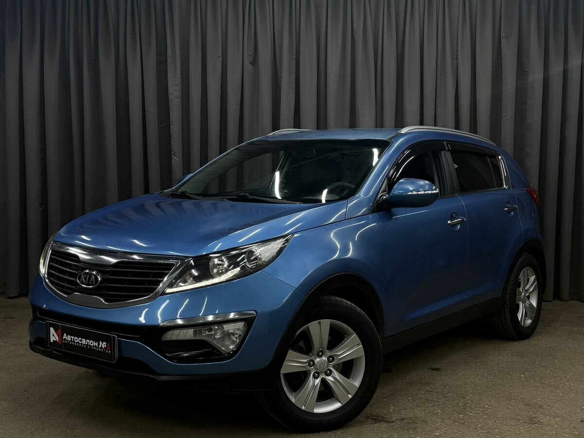 Открыть фотографии: Kia Sportage III