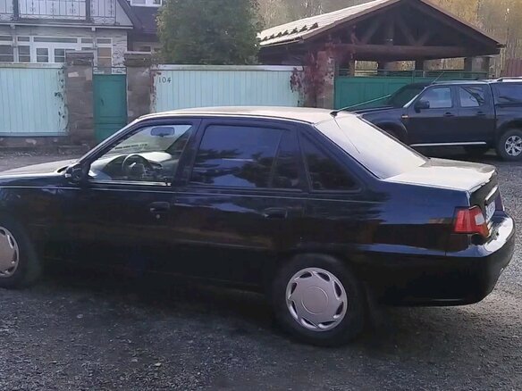 2012 Daewoo Nexia I Рестайлинг, чёрный, 220000 рублей - вид 4