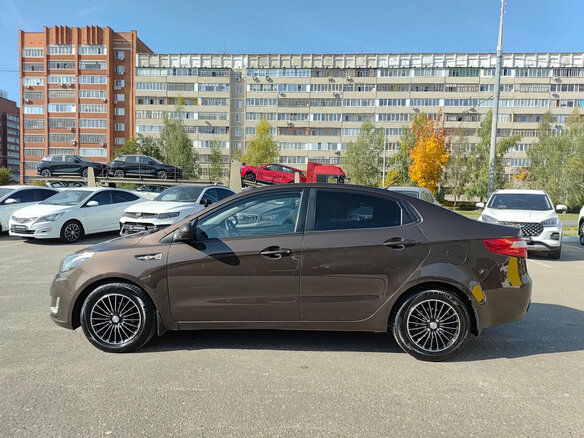 2014 Kia Rio 6-speed III, коричневый, 825000 рублей - вид 7