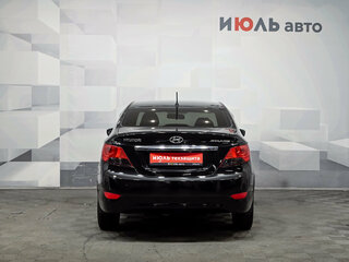 2013 Hyundai Solaris I, чёрный, 870000 рублей, вид 5