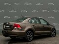 2017 Volkswagen Polo V Рестайлинг, коричневый, 998700 рублей - вид 1