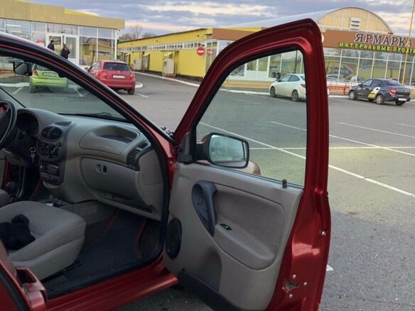 2011 Lada (ВАЗ) Kalina I, красный, 235000 рублей - вид 9