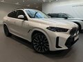 2024 BMW X6 40i III (G06) Рестайлинг, белый, 11960000 рублей - вид 2