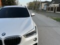 2018 BMW X1 18i sDrive II (F48), белый - вид 1